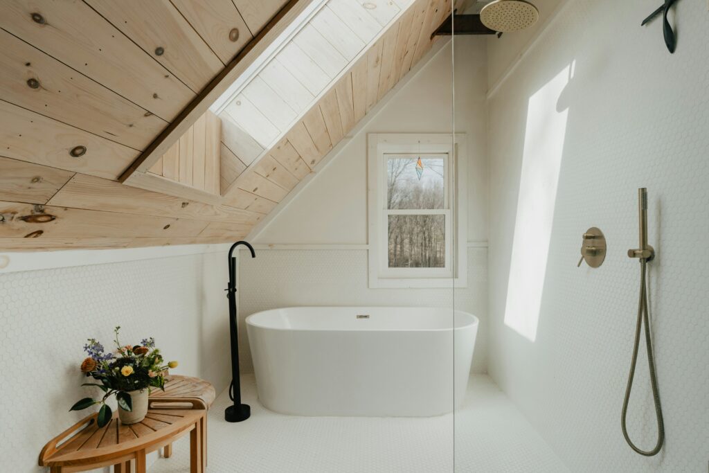 Small bathroom remodel in Portland with floating vanity and mirrors