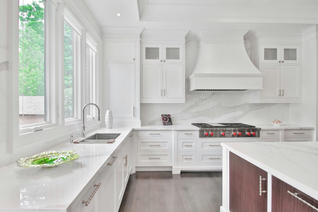 Portland kitchen with two-tone custom cabinets and a natural wood island cabinets