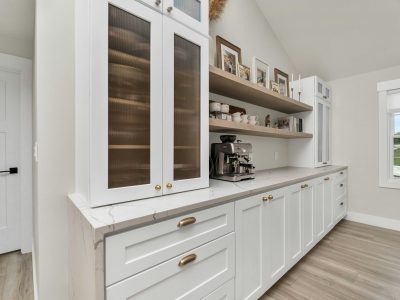 glass-front-custom-kitchen-cabinets-portland.jpg Custom kitchen cabinets with glass doors and interior lighting in Portland